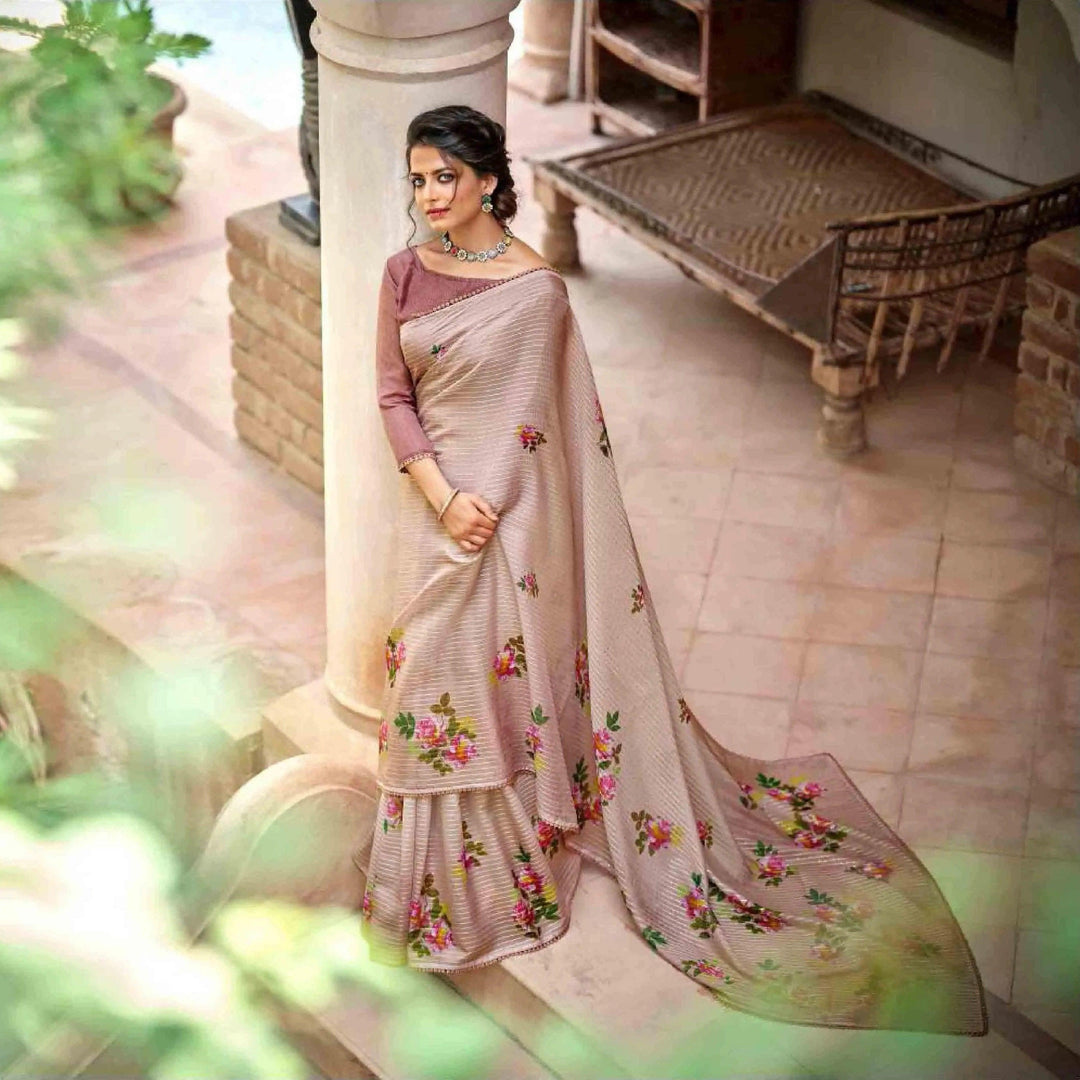 woman wearing a floral crochet saree, standing on a beautiful patio.