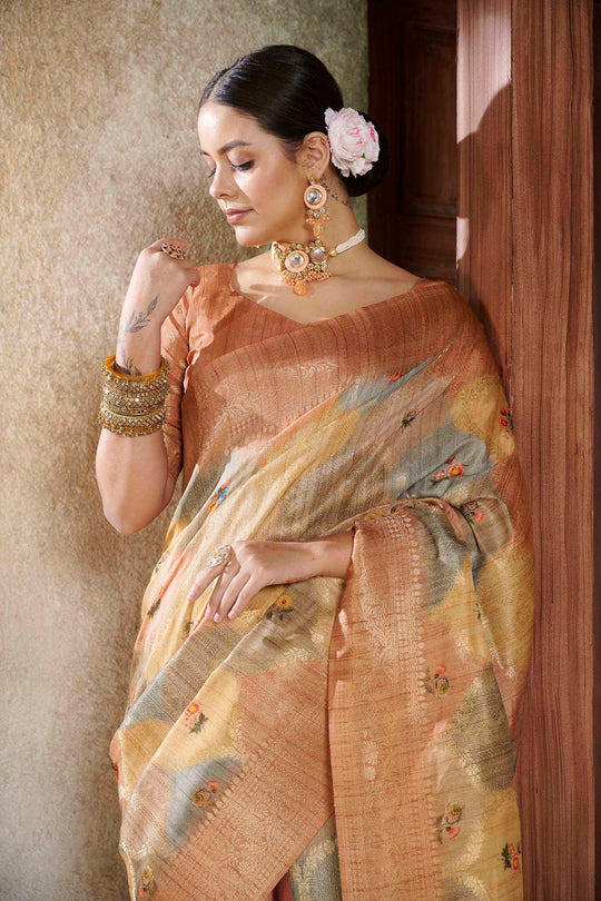 woman in Orange Savannah Saree.