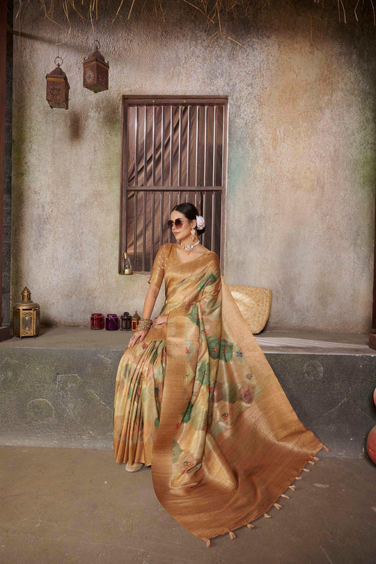 woman in gllases sitting in Tusser Yellow Savannah Saree.