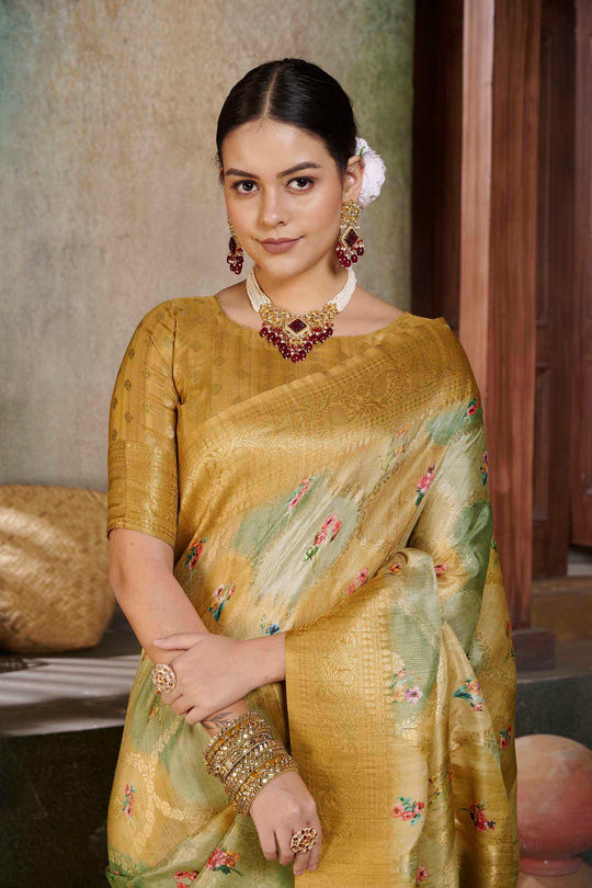 woman in Metallic Yellow Savannah Saree.