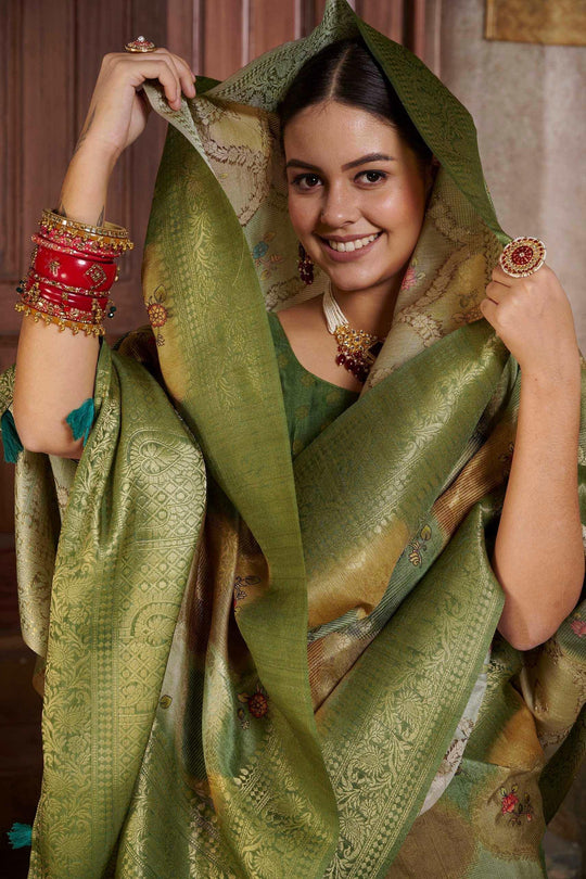 woman in Tusser Green Savannah saree.