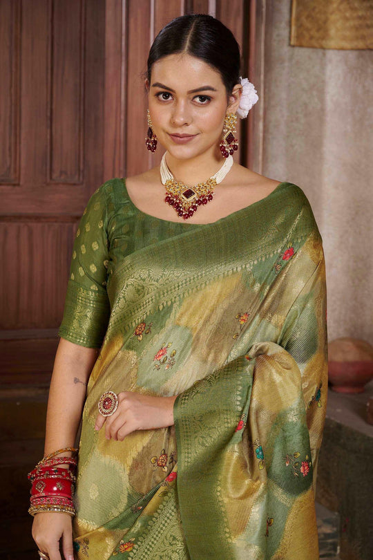 woman in Tusser Green Savannah saree.