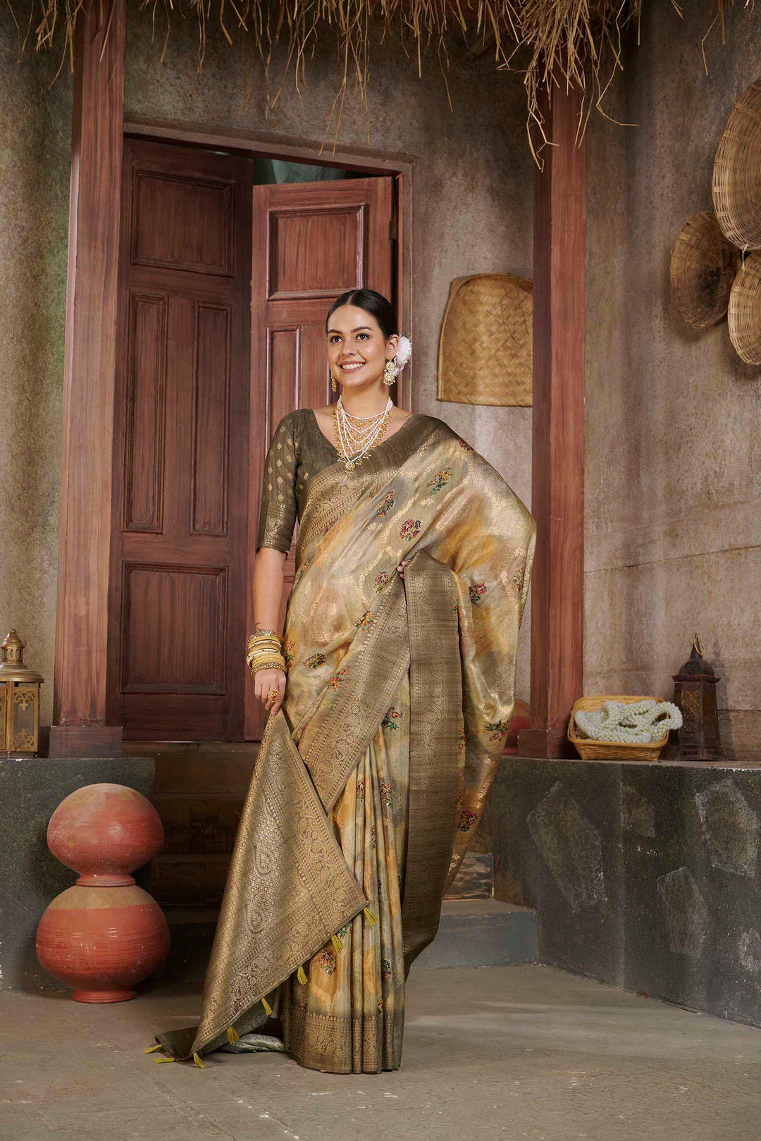 woman standing in Jacko Bean Colour Savannah Saree.