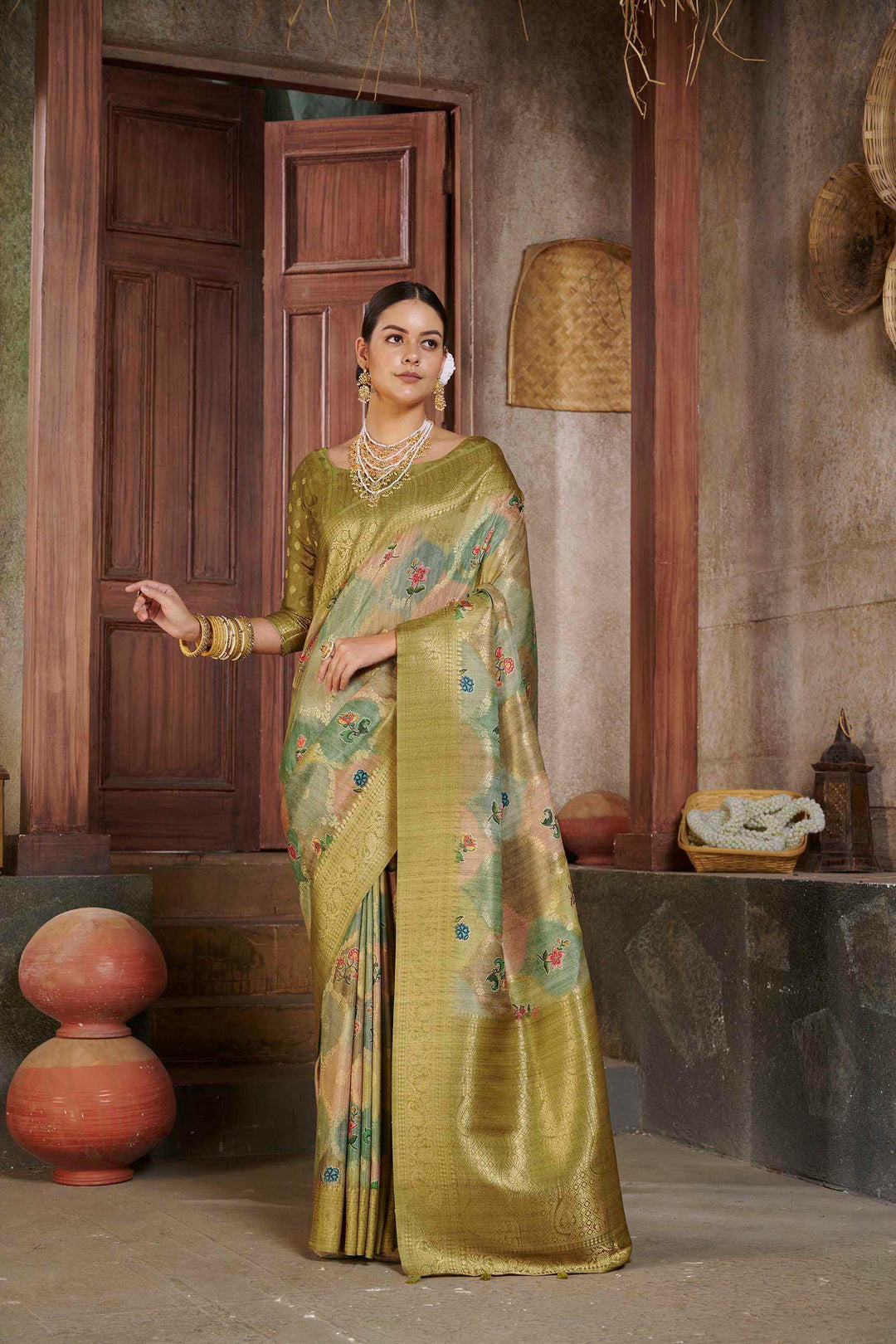 woman standing in Mehndi Savannah Saree.