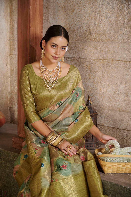 woman sitting in Mehndi Savannah Saree.