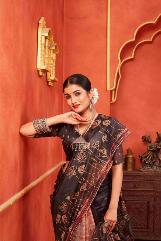 woman standing in Dark Brown Pichwai Chanderi Saree.