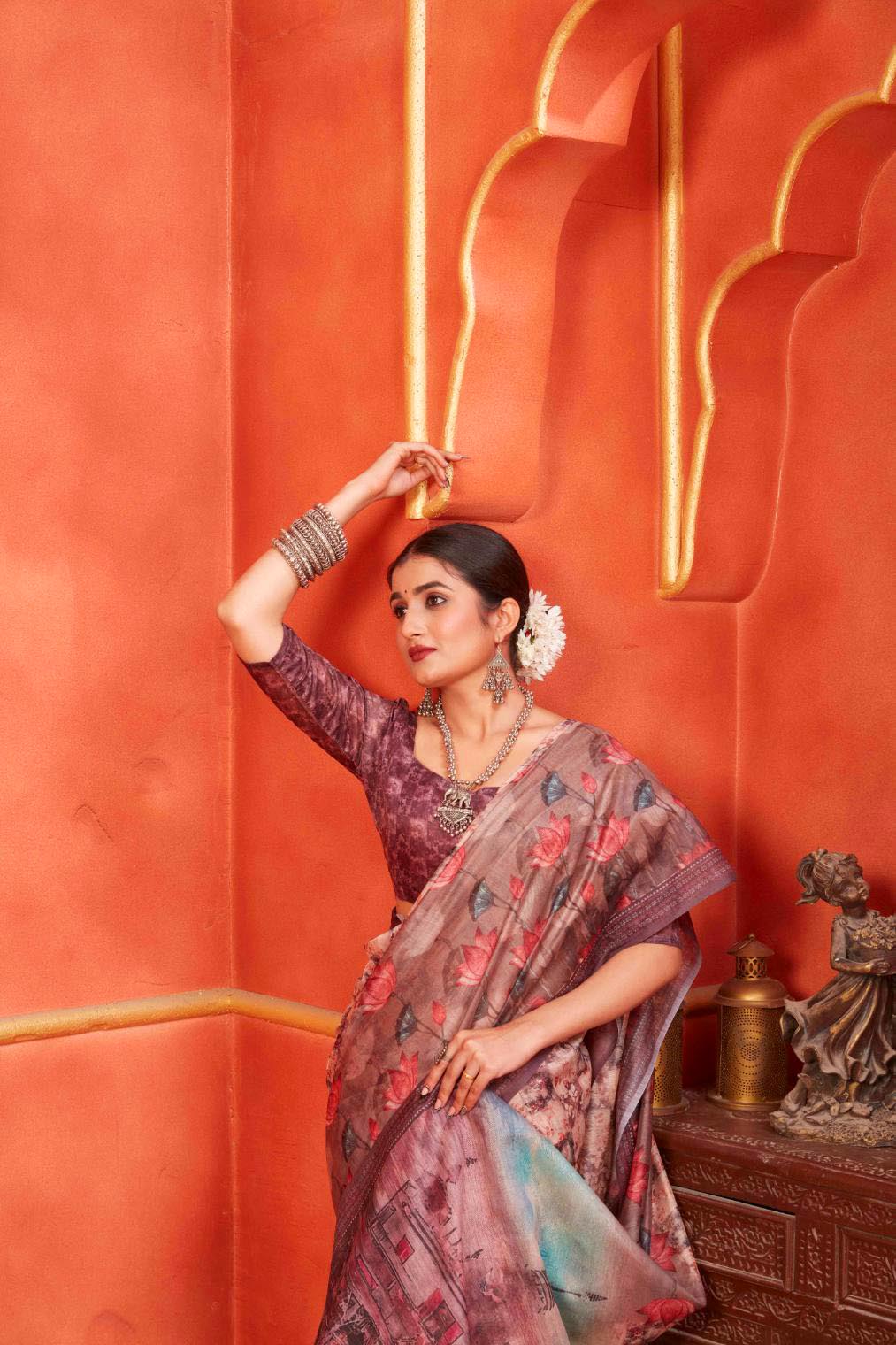 woman standing in Temple Pallu Pichwai Chanderi Saree.