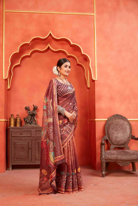 woman standing in Maroon Designer Pichwai Chanderi Saree.