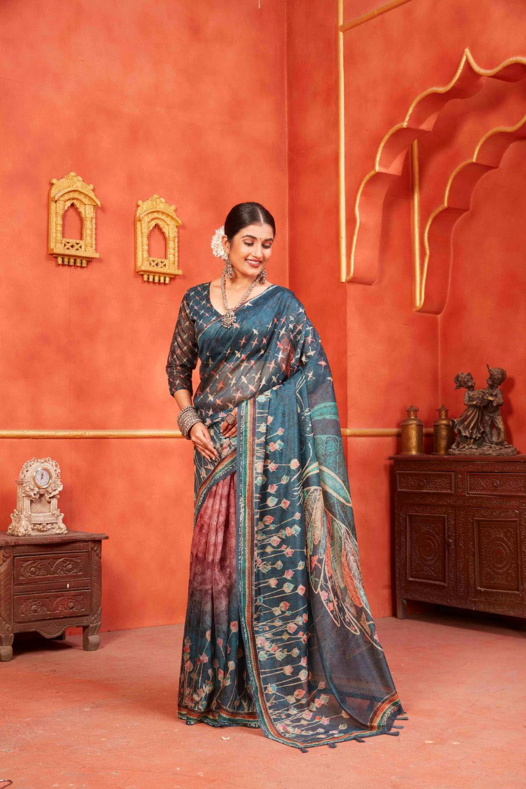 smiling woman in Indigo Designer Pichwai Chanderi Saree.