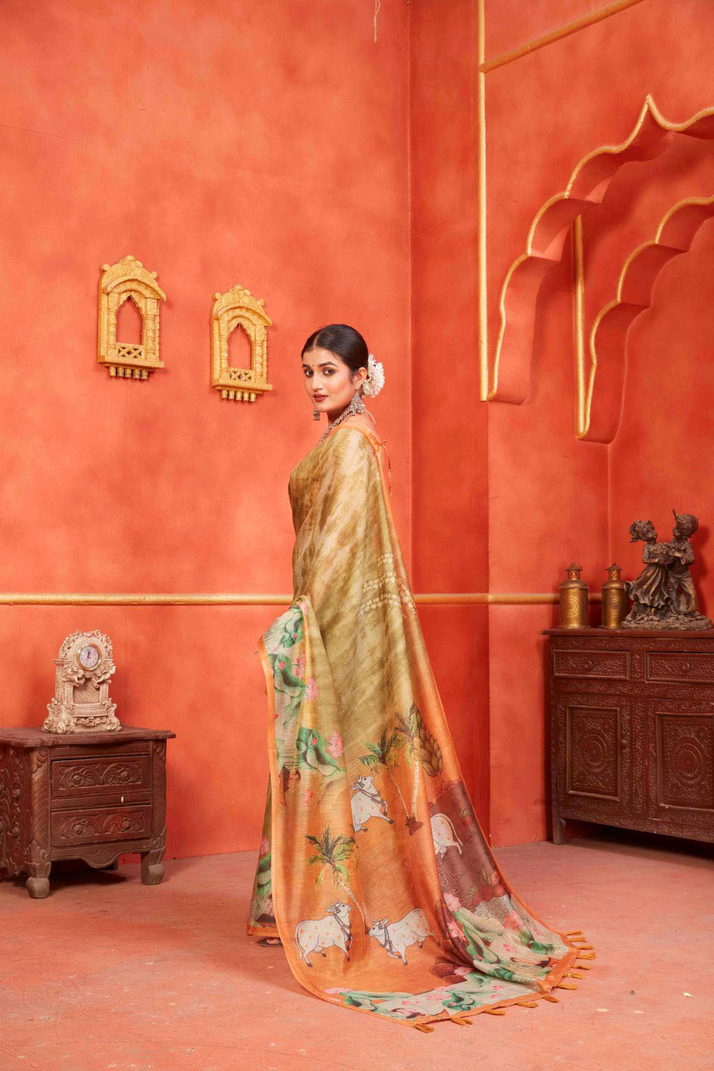 woman in Lotus & Cow Designer Pichwai Chanderi Saree.