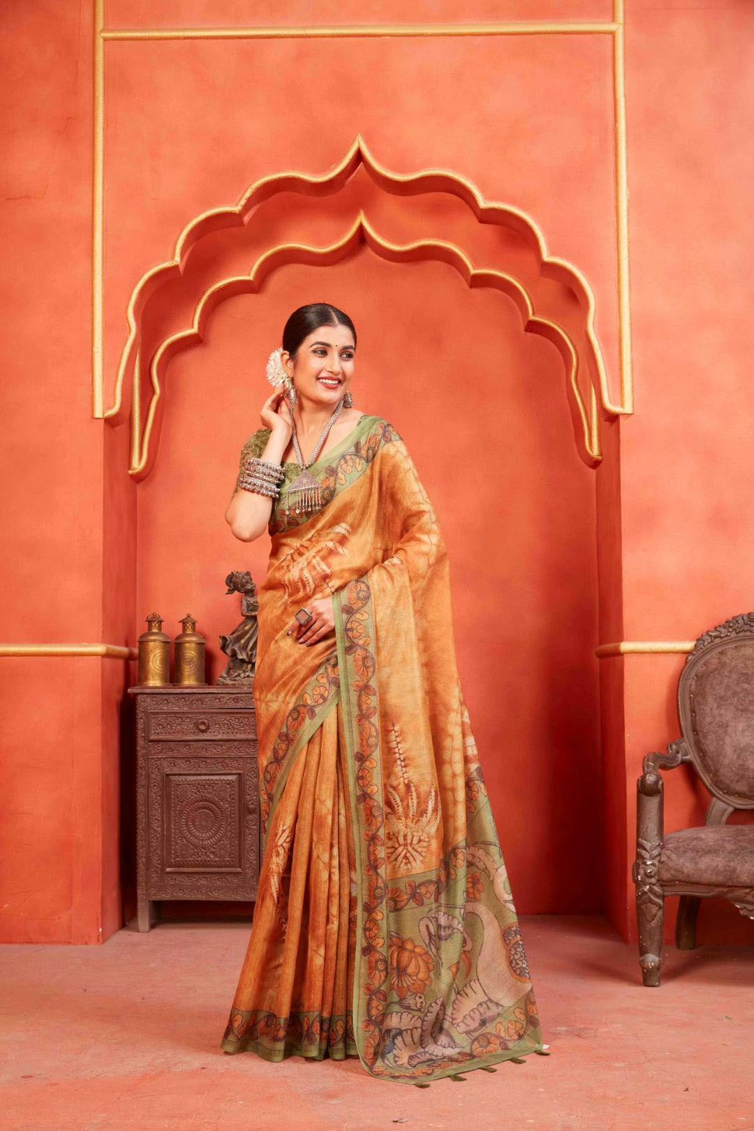 smiling woman in Kalamkari Pallu Pichwai Chanderi Saree.