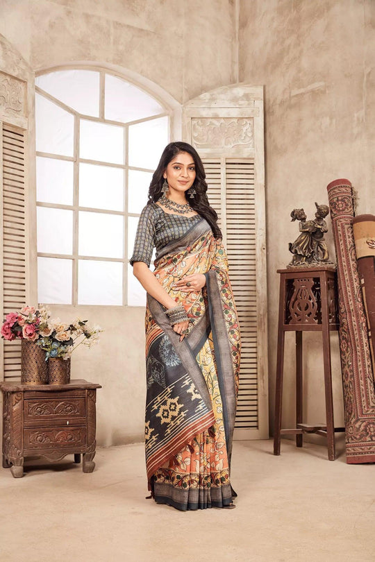 woman standing in Pastel Yellow Kalamkari diya saree.