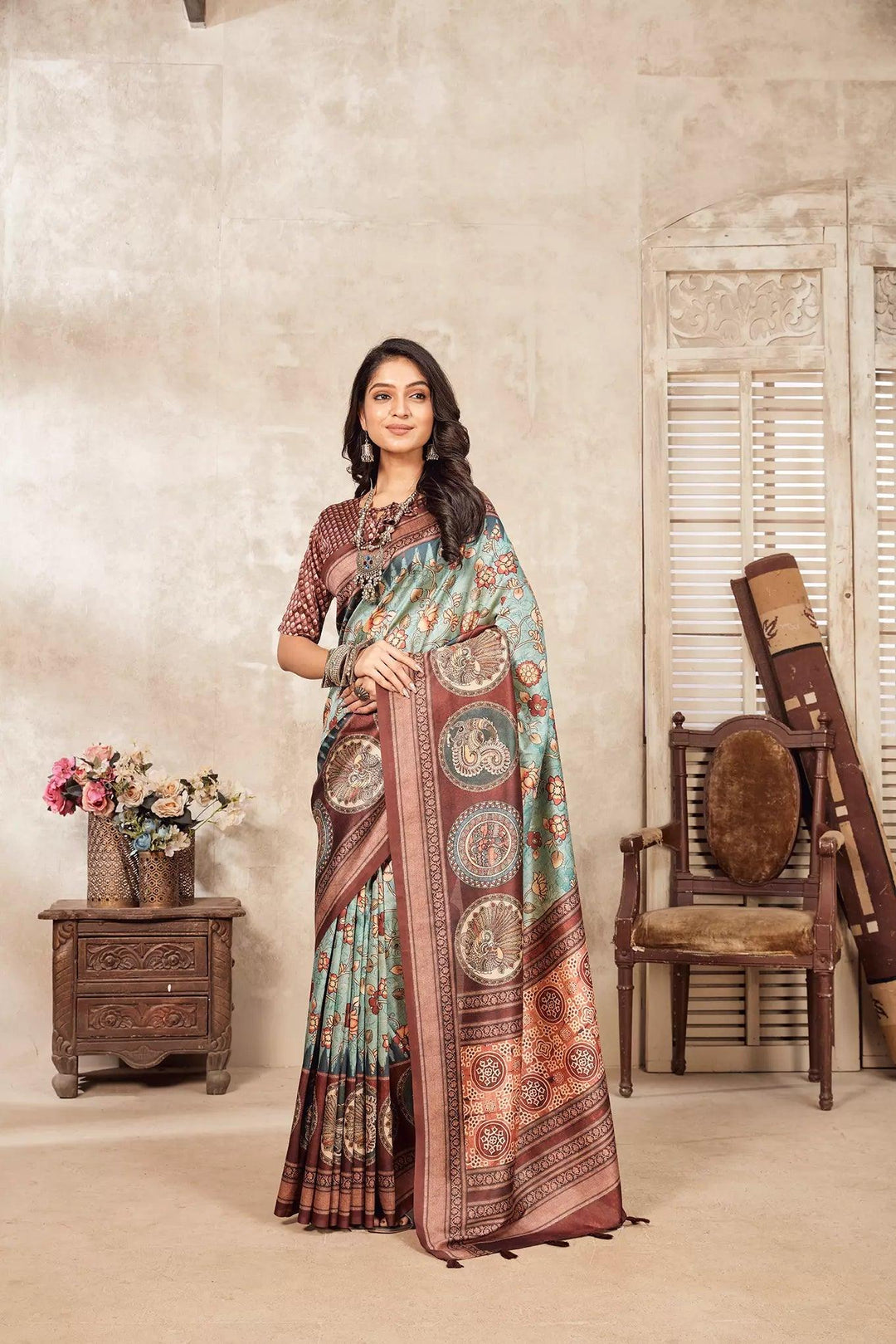 woman standing in Pastel Sky Kalamkari Figer Diya Saree.