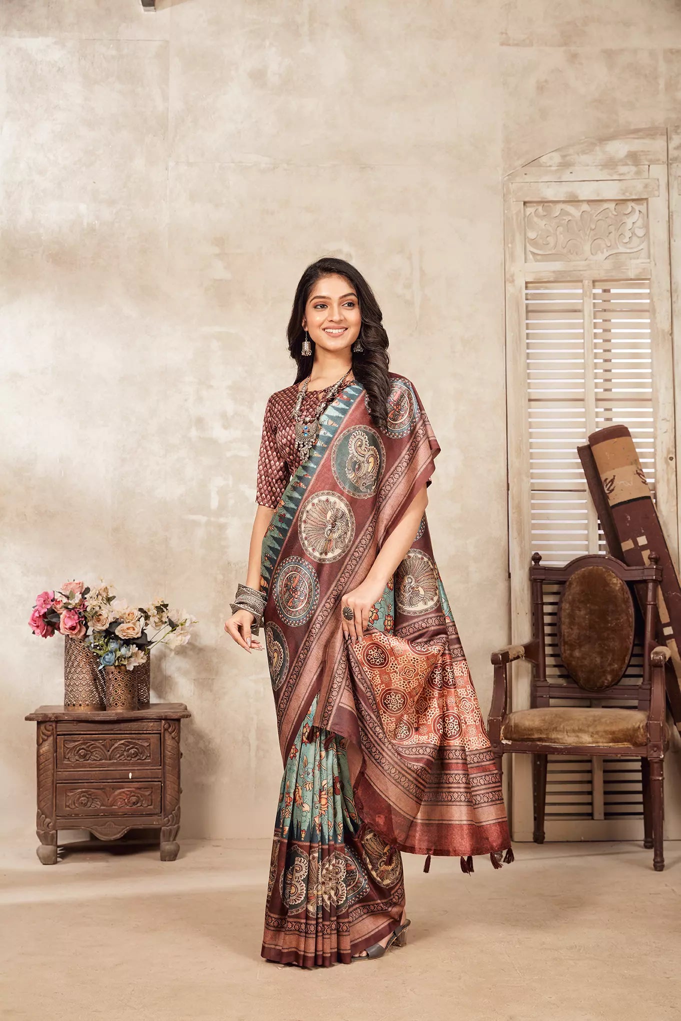 woman standing in Pastel Sky Kalamkari Figer Diya Saree.