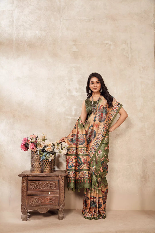 woman in Pastel Green Kalamkari Figer Diya Saree.