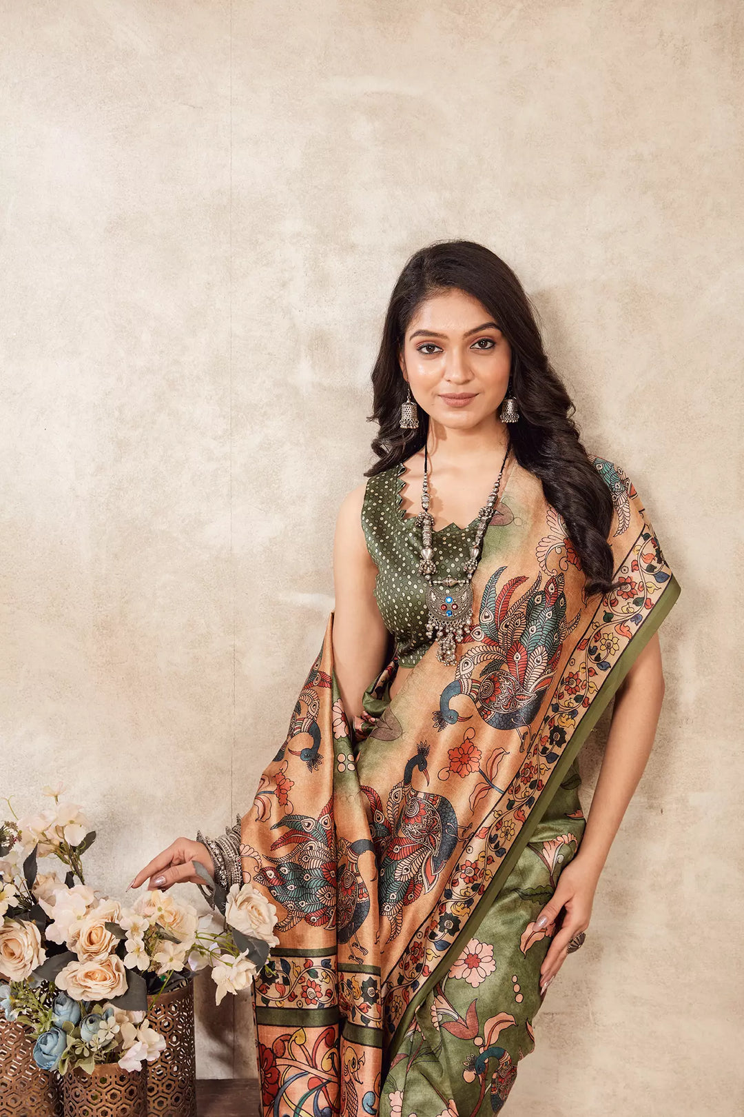 woman in Pastel Green Kalamkari Figer Diya Saree.