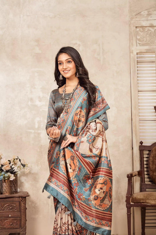 woman standing in Madhubani Kalamkari Diya Saree.