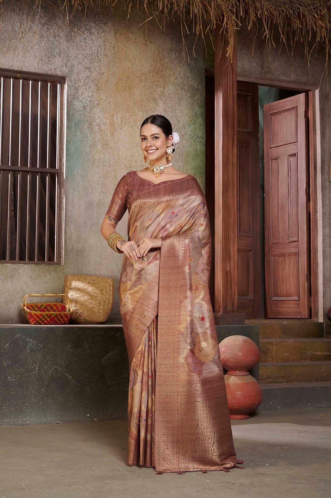 woman standing in Tusser Brown Savannah saree.